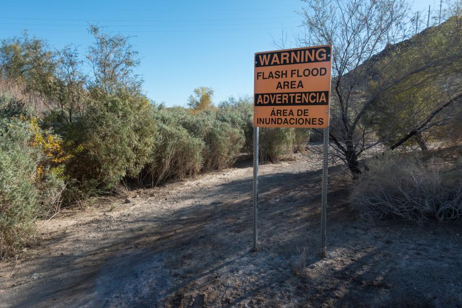 Photograph of Flash Flood Warning Sign in Forest Area