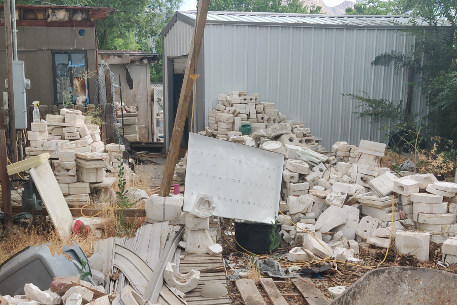 A property surrounded by junk and debri