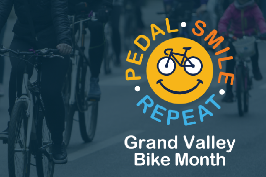 Grand Valley Bike Month logo with a smiling sun icon surrounded by the words pedal, smile, repeat.