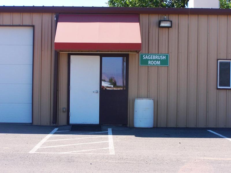 Photograph of the outside door for the Sagebrush Room