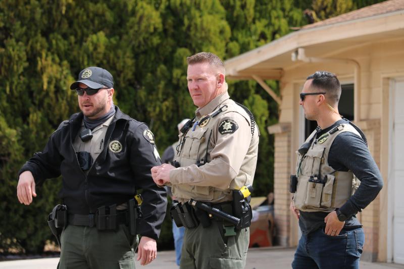 Photograph of Mesa County Sheriff Deputies in uniform at outside scene