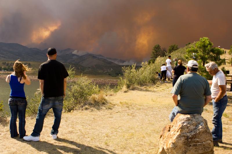 Photograph of Bystanders watching Wildfire in Mountains