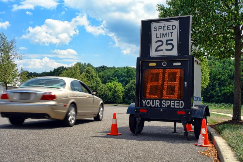 Photograph of Car driving past Speed Limit Monitor 