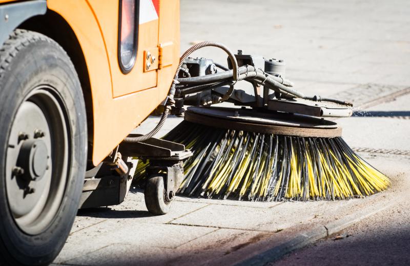 Photograph of Street sweeper machine cleaning the streets