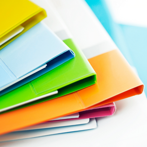 A stack of multi-colored folders