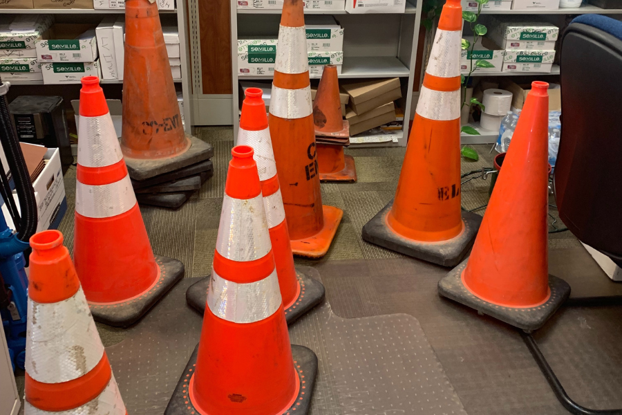 Traffic cones fill up an office
