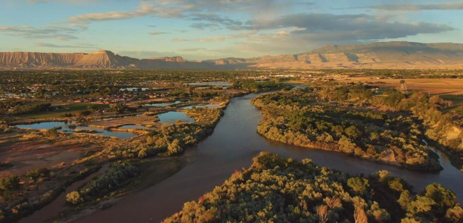 A bird's-eye view of the Grand Valley featuring the Colorado River, Mount Garfield and the Grand Mesa.
