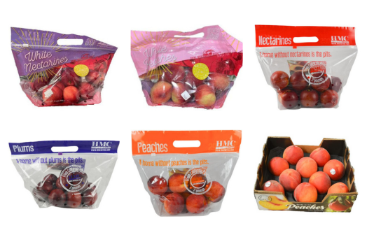 Plastic bags of peaches, plums, and nectarines. Cardboard box filled with peaches.